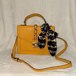 Aldo Chic Yellow Handbag with Black Scarf Accent